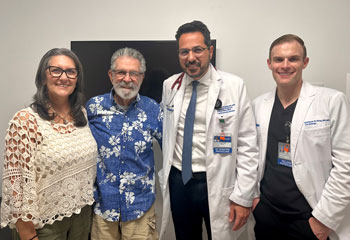 uci health cardiologist dr. antonio frangieh with tavr recipient bob bolen and his daughter, along with a uci health cardiology fellow