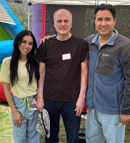 uci health burn program pa Seda Gevorgyan, PA, patient James Mousaw and medical director Dr. Syed Saquib pose for a photo at the annual uci health burn picnic