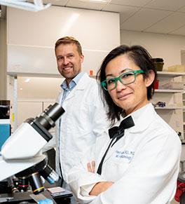UC Irvine vision researchers Frans Vinberg, left, and Dr. Kimberly Gokoffski pictured in their laboratory, where both are working on a national effort to make whole-eye transplants possible.