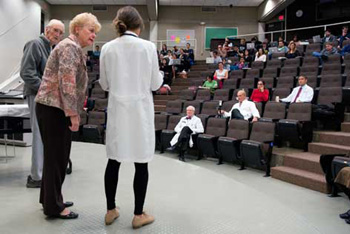 Actors Stu Erickson, Judy Jones and Malia Wright (from left) demonstrate for a “Clinical Foundations” class the right and wrong approaches to geriatric care. Steve Zylius/UC Irvine