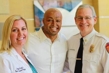 J.R. Martinez pictured with Jennifer Cash, RN, UCI Health Burn Program Manager and Randy Bruegman, Anaheim Fire Chief