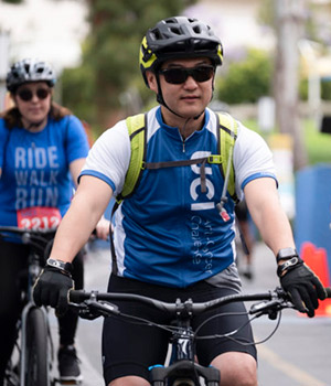 UCI Health neurosurgeon Dr. Frank Hsu participates in the UCI Anti-Cancer Challenge, an annual fundraiser for cancer research sponsored by the UCI Health Chao Family Comprehensive Cancer Center.