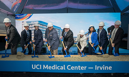 Leaders of UCI and the community join donors to break ground on a new $1.3 billion hospital and medical complex on the university campus in Irvine. Pictured left to right are UCI campus architect James Pratt, UCI Medical School Dean Michael Stamos, UCI Vice Chancellor Steve A.N. Goldstein, UC Regent John Pérez, UCI Chancellor Howard Gillman; UCI Health Executive Vice President Carrie Byington, Irvine Mayor Farrah N. Khan; UCI Health CEO Chad Lefteris and Brian Hervey, UCI vice chancellor for advancement,