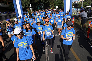 Throngs of volunteers walk to raise funds for cancer research at the 2022 UCI Anti-Cancer Challenge.