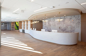 The new home for the Susan Samueli Integrative Health Institute on the UCI campus features this spacious lobby.