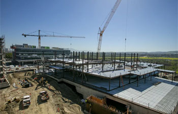 wide angle shot of cranes with acute care hospital for the UCI Medical Center Irvine-Newport is under construction on Friday.(Scott Smeltzer / Staff Photographer)