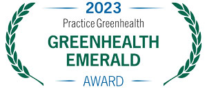 2023 practice greenhealth emerald award logo green and blue letters on white background with laurel leaves on both sides