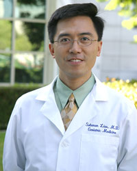 uci health physician and palliative care services director solomon liao outside wearing white coat