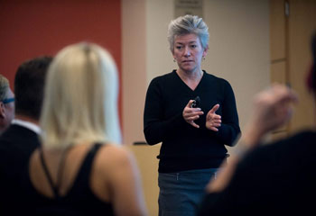 uc irvine professor aileen andersen phd speaking to a classroom