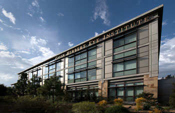 uci health gavin herbert eye institute exterior with clouds behind in low daylight