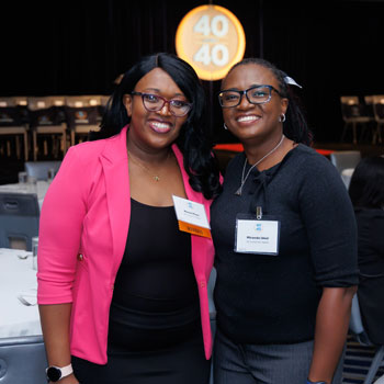 uci health medical intensive care unit nurse manager muriel moyo at the irvine chamber of commerce 40 under 40 awards with uci health nurse anesthetist miranda ideal