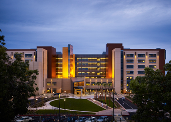 uci medical center in orange, part of uci health, lit up at night