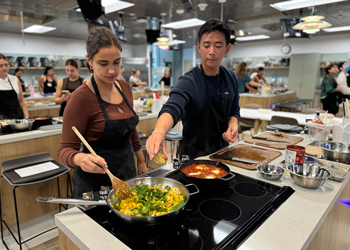 students learn healthy cooking skills in the uci health susan samueli integrative health institute teaching kitchen