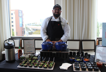 a chef stands with food items for patients at a taste test at uci medical center the flagship hospital in Orange