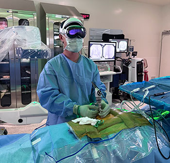 UCI Health spine surgeon Dr. Don Park wearing AR headset.