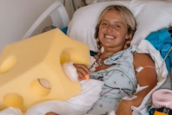 elieah boyd recovers in bed at uci health orange uci medical center after her arm was reattached by a team of surgeons