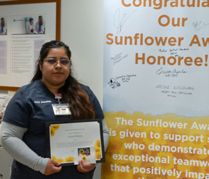 uci medical center medical assistant ivette flores celebrates with her sunflower award