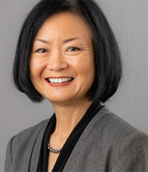 studio headshot of uci health chief pharmacy officer melanie joe, who is also the associate director and founding associate dean for Pharmacy Professional Affairs at the UC Irvine School of Pharmacy & Pharmaceutical Sciences