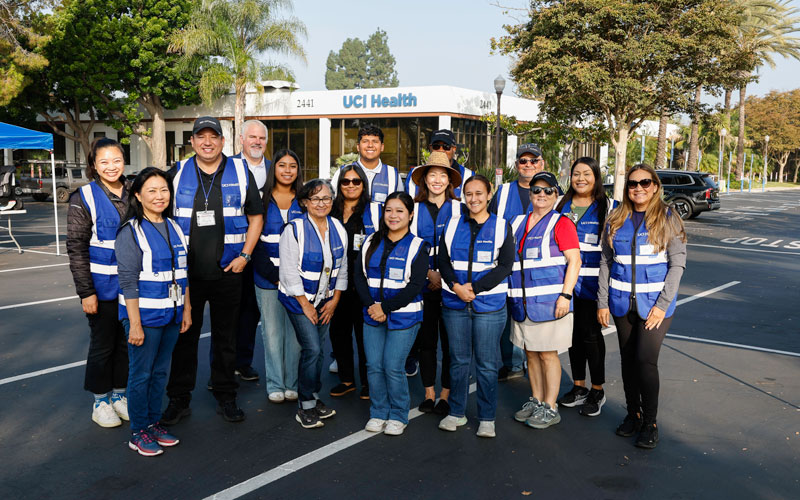 uci health family health center anaheim car seat program safety team members pose for a large group photo