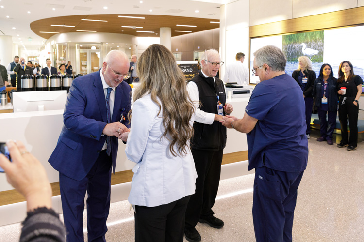 the uci health chaplains lead a blessing of the hands at the opening of uci health — irvine acute care hospital on dec 10 2025