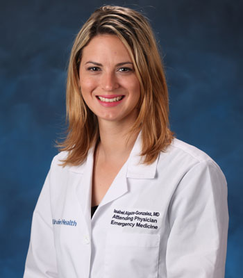 uci health emergency medicine physician dr. isabel algaze gonzalez in a white coat in front of a blue studio background