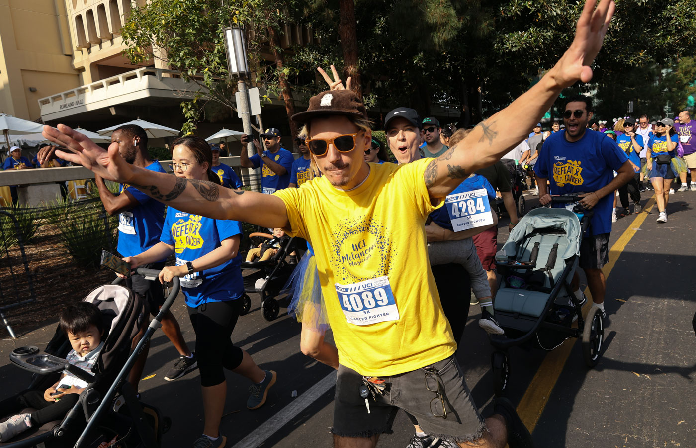 Cyclists have fun at the UC Irvine Anti-Cancer Challenge just after dawn on Oct. 11, 2025. to support cancer research."