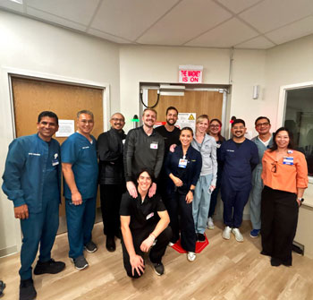 the uci health neurology mr guided focused ultrasound team in irvine poses for a photo after successfully treating their first patient who has essential treamor