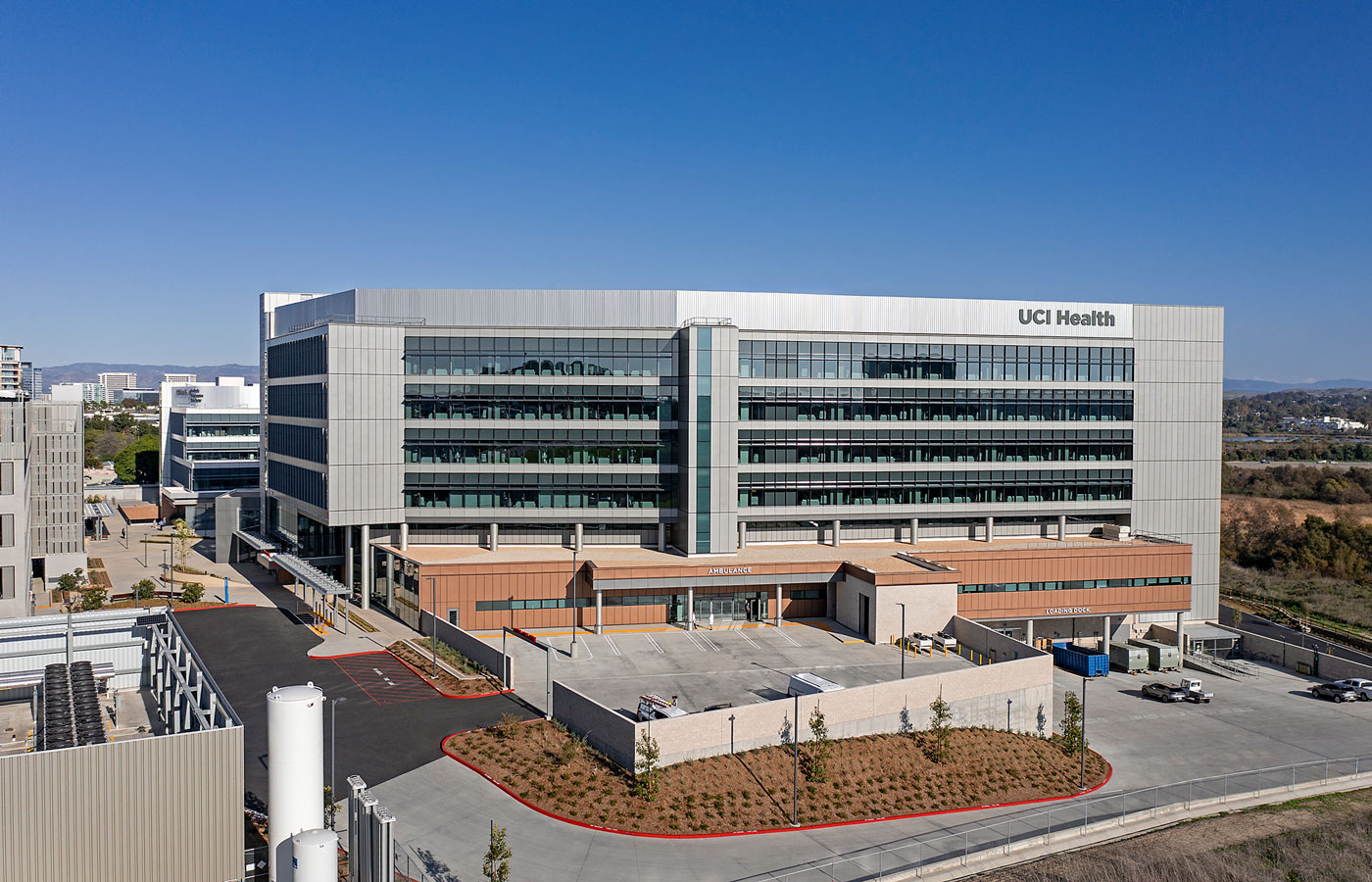 a daytime front shot of uci health -- irvine the nation's first all electric acute care hospital