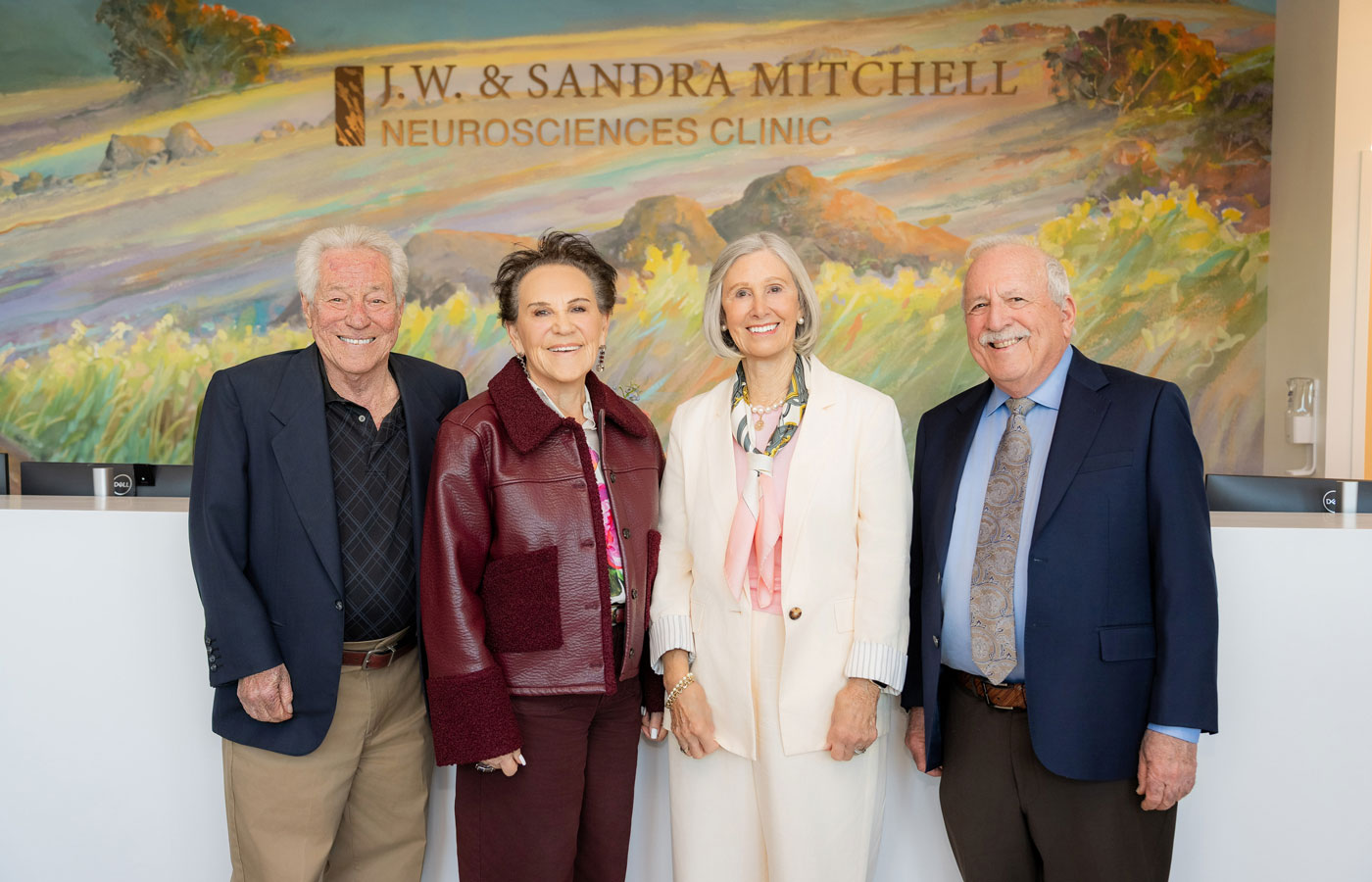 J.W. and Sandra L. Mitchell Foundation trustees Richard Goodman, Cecilia Goodman, Susan Laird and Howard Schulman, stand in front of the J.W. & Sandra Mitchell Neurosciences Clinic. 