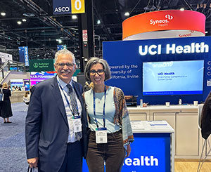 Dr. Miguel Villalona Calero, left, poses with Dr. Nadine Abi-Jaoudeh during a break at the 2026 ASCO conference in Chicago.