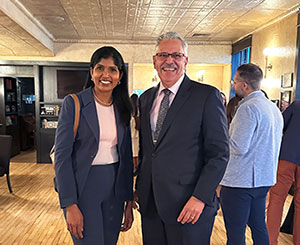 Dr. Miguel Villalona Calero, left, poses with Dr. Maheswari Senthil at a reception during the 2026 ASCO conference in Chicago.