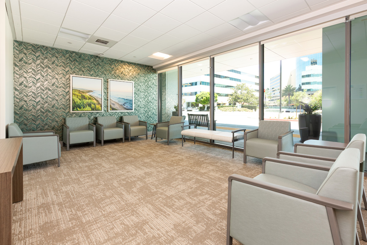uci health — irvine rehabilitation hospital waiting area with seating and large windows