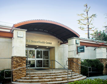 the uci health senior health center building at uci health — orange on a clear day