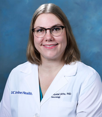 uci health neurologist dr. crystal jicha wearing a white coat in front of a blue studio background