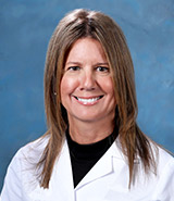 Dr. Karen Todd Lane is a board-certified UCI Health surgical oncologist who specializes in examining and treating patients with benign and cancerous breast lumps. 
