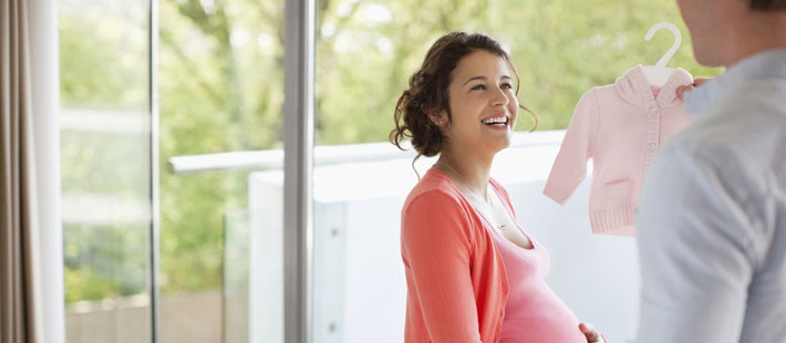 woman looking at top for baby