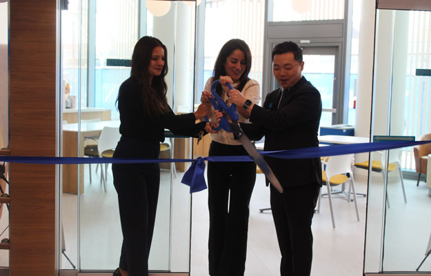 leadership at uci health cuts the ribbon at the opening of the tony and daisy fan family cafe at the uci health chao family cancer center and ambulatory care building in Irvine