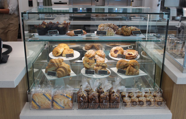 pastries on display behind a window at the opening of the tony and daisy fan family cafe at the uci health chao family cancer center and ambulatory care building in Irvine