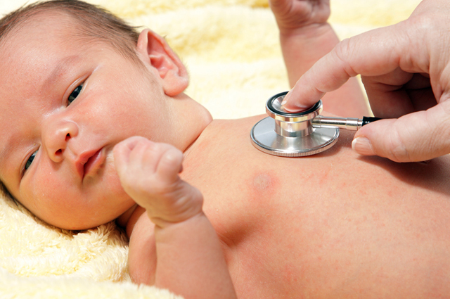 UCI Health pediatrician with newborn