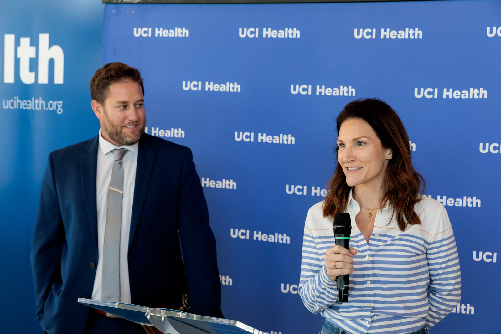a representative from hensel phelps in front of the uci health step and repeat at the uci health irvine substantial completion event on sept 19 2025