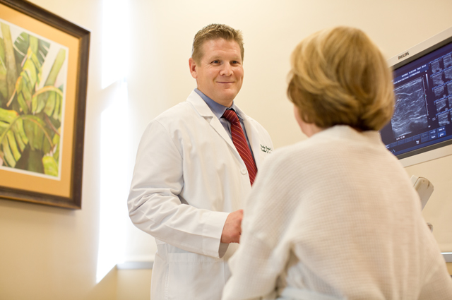 Radiologist Freddie Combs, MD, consults with a patient at Pacific Breast Care. 