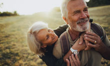 man and woman with prediabetes hugging