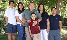 Sean Ramos, pictured with his wife Rebecca and their four children, underwent a successful bone marrow transplant at UCI Health Chao Family Cancer Center.