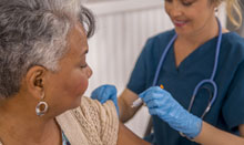 woman getting shingles vaccine