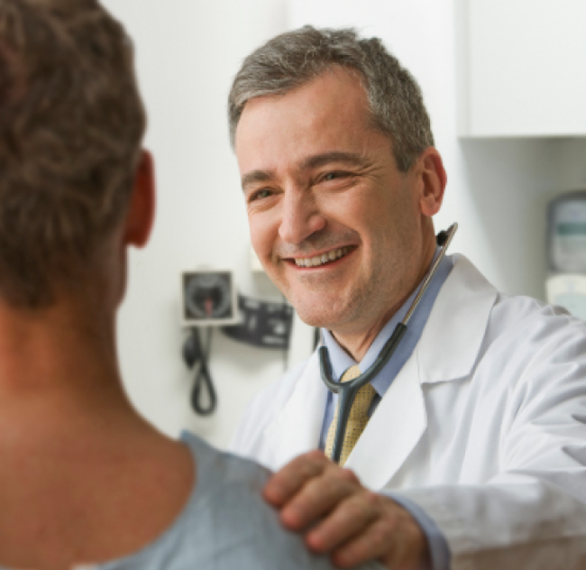 doctor with hand on patient shoulder